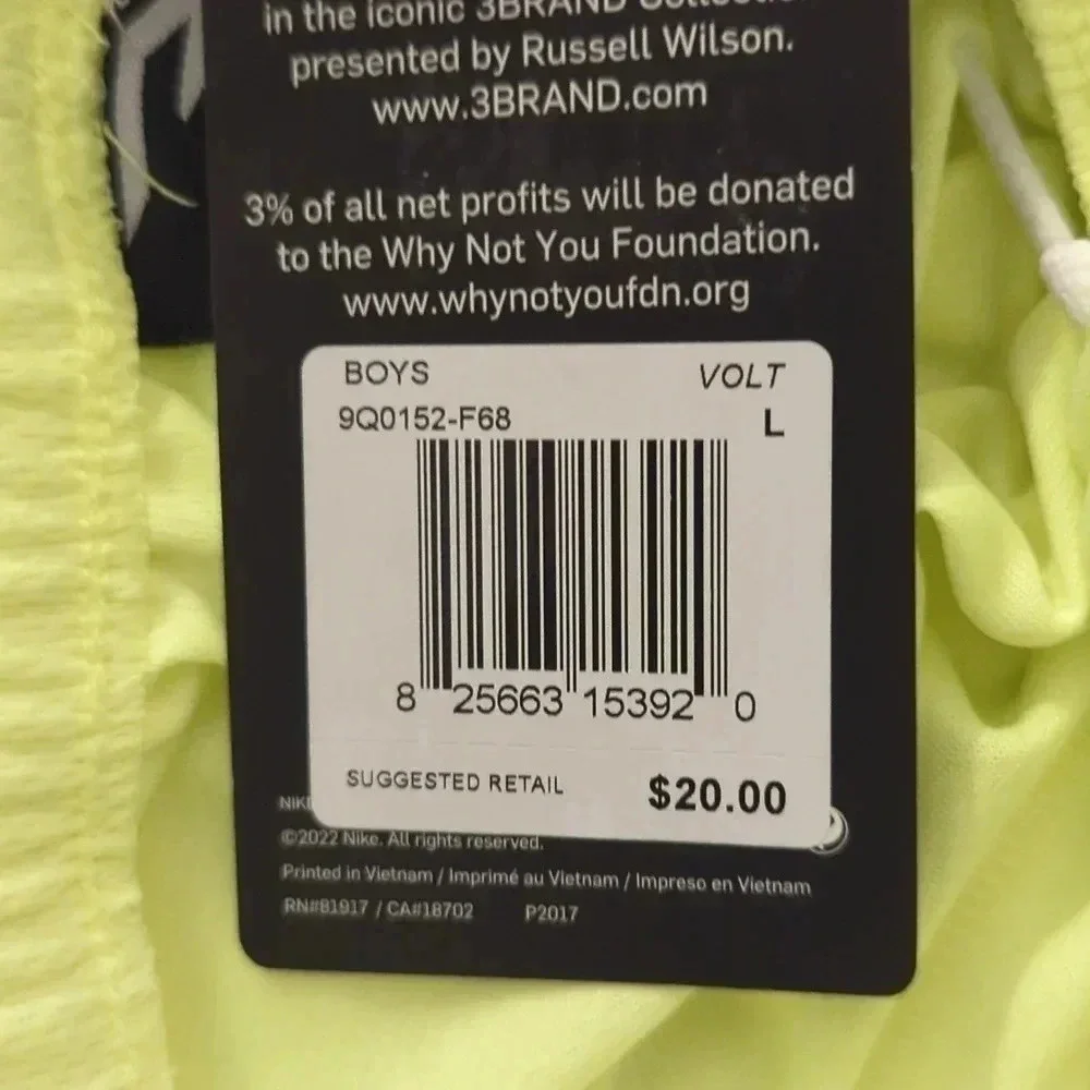 BOYS neon green Nike shorts